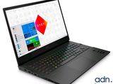 a black laptop with a colorful logo on the screen