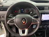 the interior of a car with a steering wheel and dashboard controls