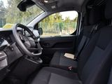 a view of the inside of a truck with the driver ' s seat up