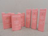 four boxes of sanofore skin care products sitting on a table