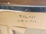 a piece of wood that has writing on it