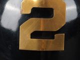 a close up of a baseball helmet with the number 2 on it