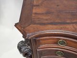 a wooden table with a drawer on top of it