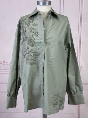 an image of a green shirt on a mannequin mannequin mannequin mannequin mannequin mannequin mannequin mannequin