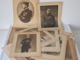 many old photos of men in military uniforms on a table