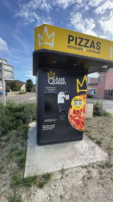 a vending machine on the side of the road
