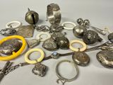 a lot of silver items that are on a table