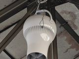 a light that is hanging from the ceiling of a building