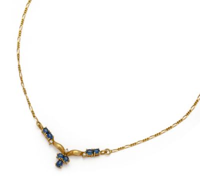 an image of a gold necklace with blue stones on a white background