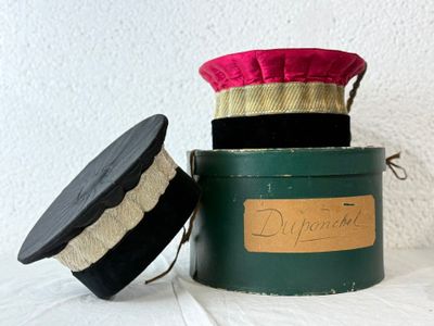 two hats that are sitting on top of each other