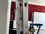 a picture of a ladder that is leaning against a wall