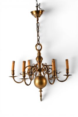 brass chandelier with five arms and five lights hanging from the ceiling