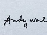 a close up of a piece of paper with a handwriting on it