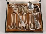 a box with a set of silverware in it