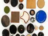 an image of a collection of various bowls and plates on a white surface