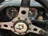 a steering wheel with the emblem of a car on it