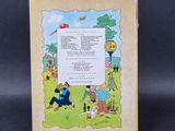 an old children ' s book with a picture of a man and a woman in a park