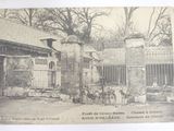an old photo of a group of people standing outside of a building