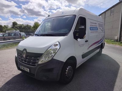 a white van that is parked on the side of the road