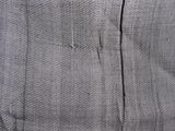 a close up of a piece of fabric with a hole in it