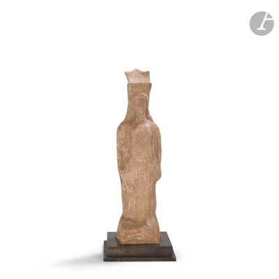 an image of a statue of a woman standing on a wooden base