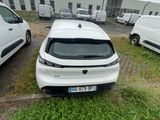 a white car that is parked in a parking lot