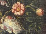 an old painting of flowers in a vase on a table