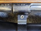 a close up of a gun on display on a table