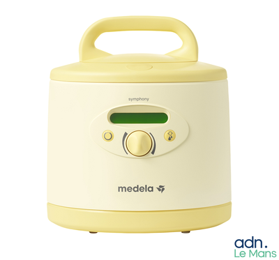 a white and yellow blender sitting on top of a table
