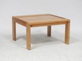 an image of a small wooden table on a white background