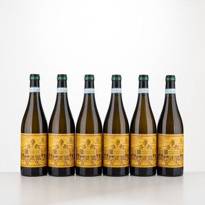 six bottles of wine are lined up on a table