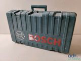 a blue case with a logo on it sitting on a table