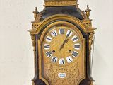 a clock that is sitting on top of a table