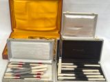several different types of knives are in a case on a table