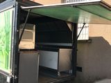 a truck that is parked in front of a building