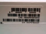 a bar code on the back of a white box