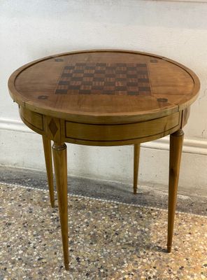 an image of a wooden table with a chess board on it