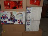 two boxes of toys on top of each other on the floor