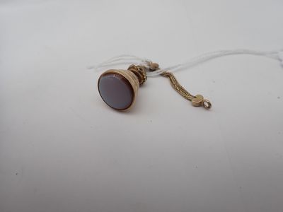 a small brown object on a white table