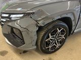 a picture of the front of a car that has been badly damaged
