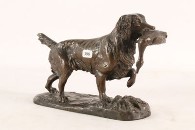 statue of a dog holding a bird in its mouth on a white background