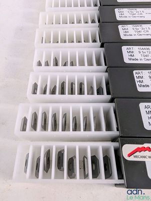 a lot of different types of screws in the box