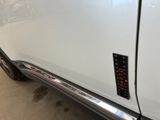 a close up of a car with a sticker on the side of it
