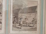 two framed pictures of a man and a woman playing with a dog