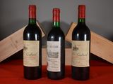 three bottles of wine sitting next to each other on a table