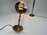 a lamp that is sitting on a table next to a lamp