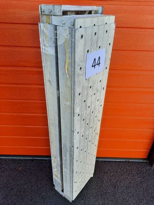 a close up of a metal pole with a number on it