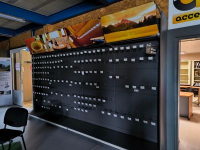 an image of a wall of mailboxs in a building
