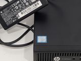 a laptop computer with a power cord attached to it