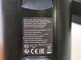 a close up view of a small black device